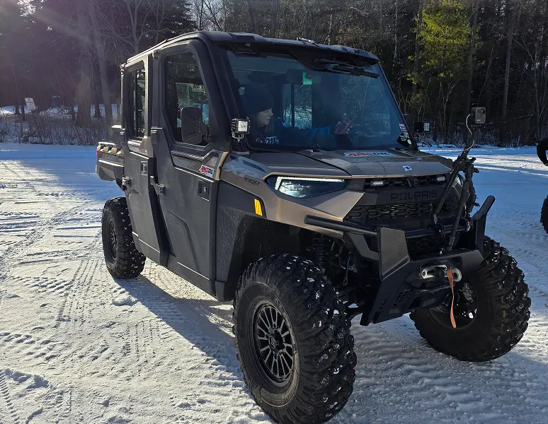 All-terrain vehicle on snow-covered ground