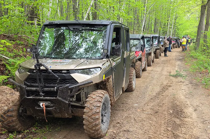 Off-road vehicles on forest trail